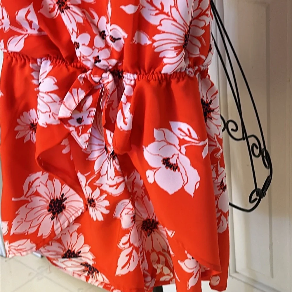 My Michelle girls floral romper orang & white one button bow in back. si…